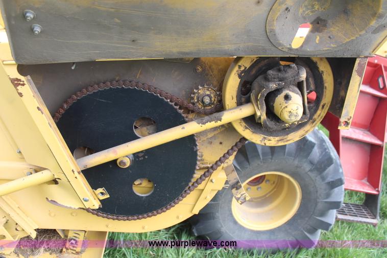 image for item H6091 1990 New Holland 1118 swather