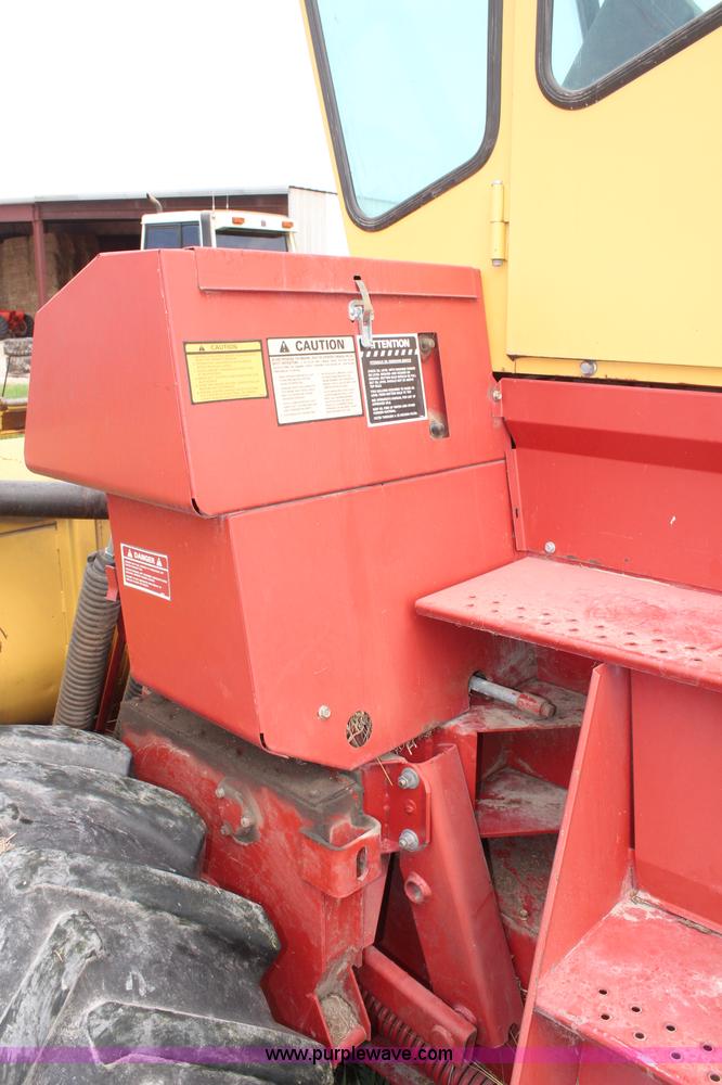 image for item H6091 1990 New Holland 1118 swather