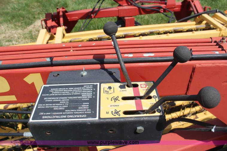 image for item H6093 New Holland 216 twin rake