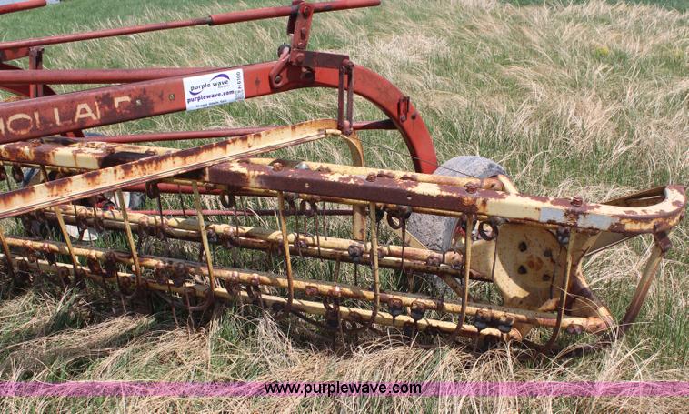 image for item H6100 New Holland 256 side delivery rake