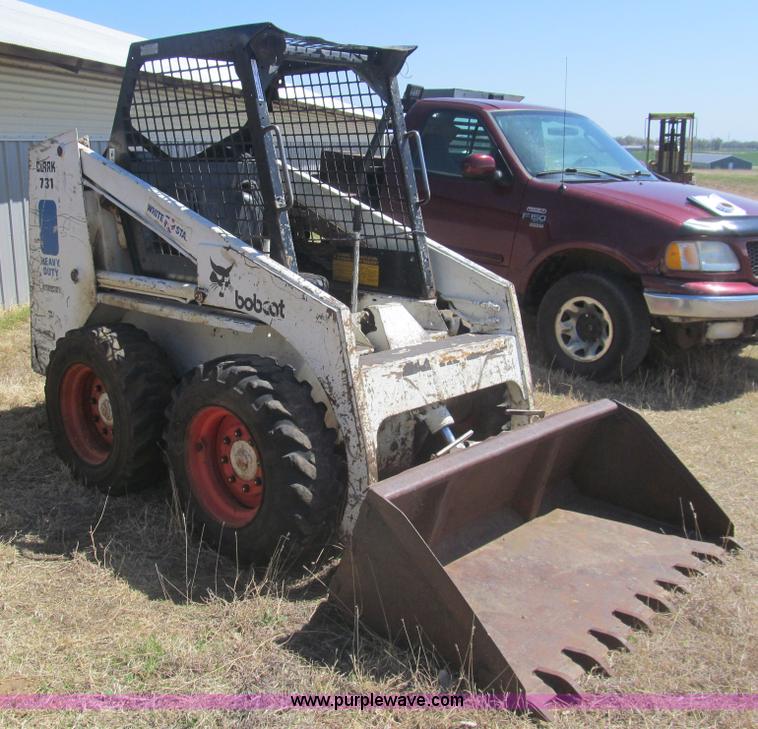 image for item AQ9852 Bobcat 731 skid steer