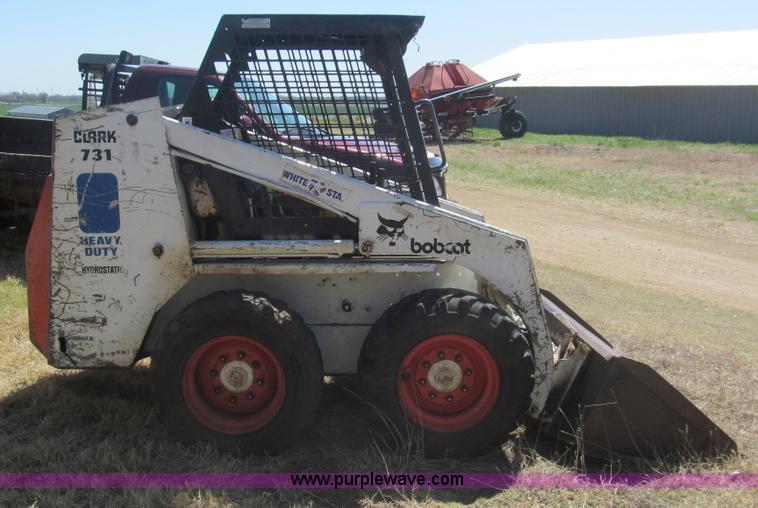 image for item AQ9852 Bobcat 731 skid steer