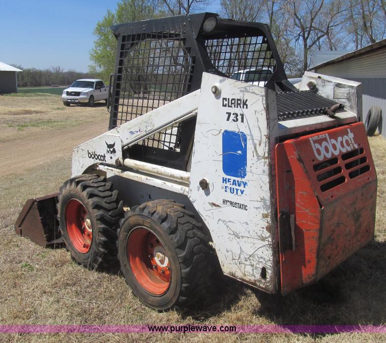 image for item AQ9852 Bobcat 731 skid steer