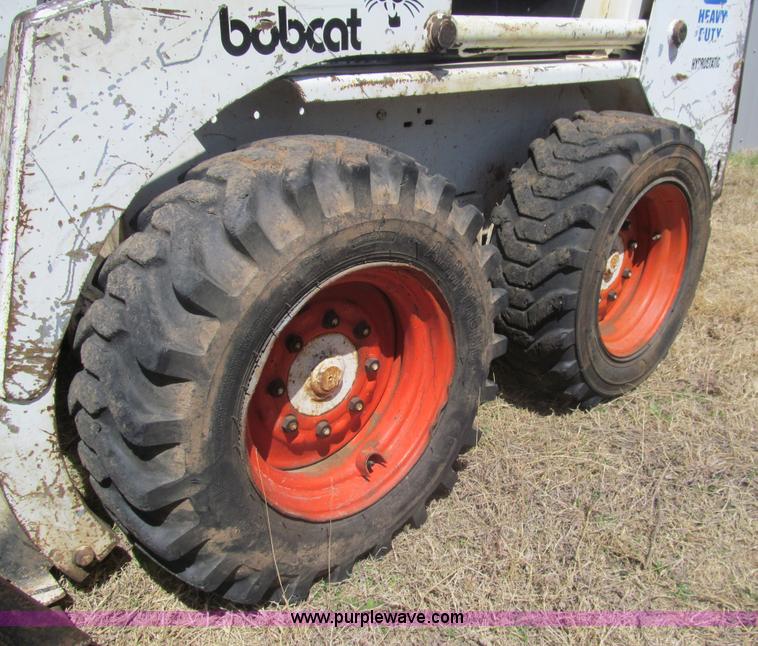 image for item AQ9852 Bobcat 731 skid steer