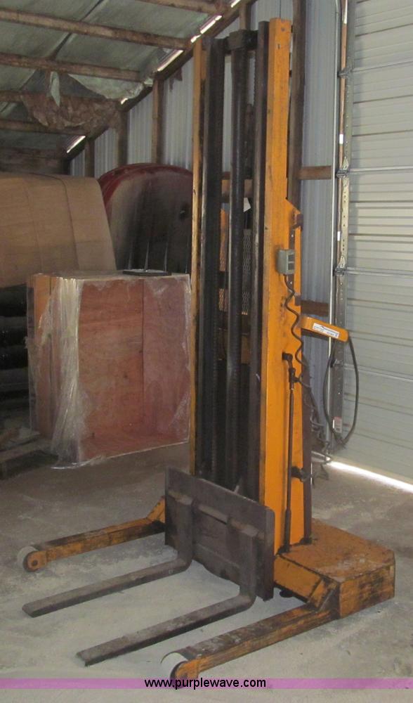 image for item AQ9864 Big Joe manual push electric lift