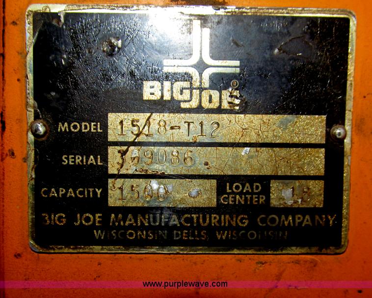 image for item AQ9864 Big Joe manual push electric lift