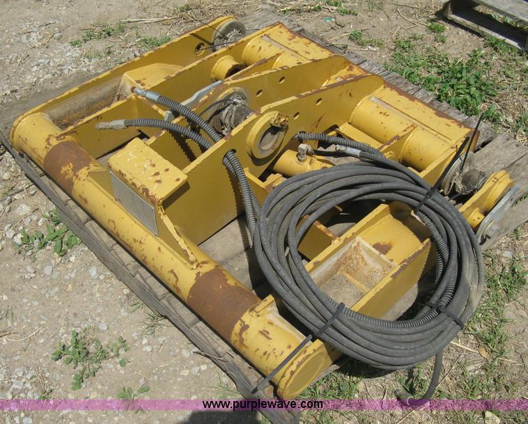 image for item AX9767 Caterpillar quick attach loader coupler