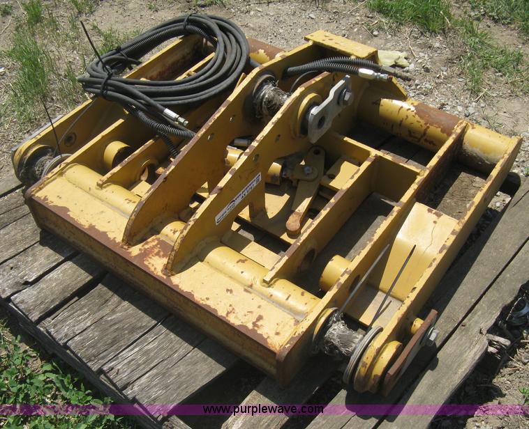image for item AX9767 Caterpillar quick attach loader coupler
