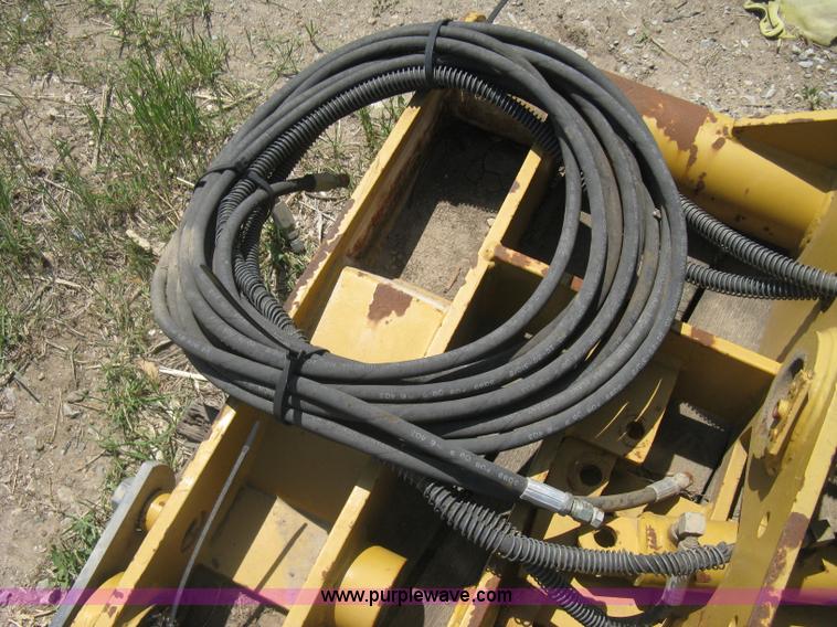 image for item AX9767 Caterpillar quick attach loader coupler