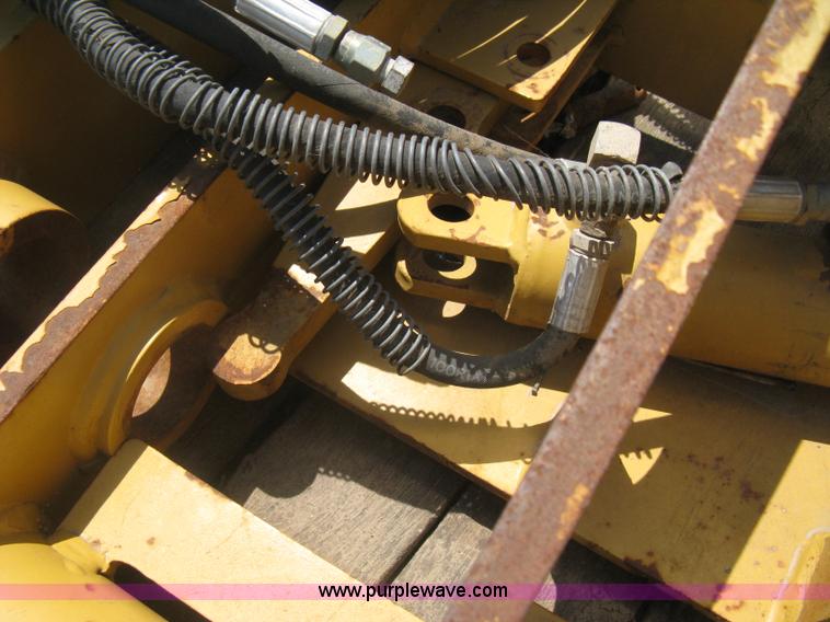 image for item AX9767 Caterpillar quick attach loader coupler