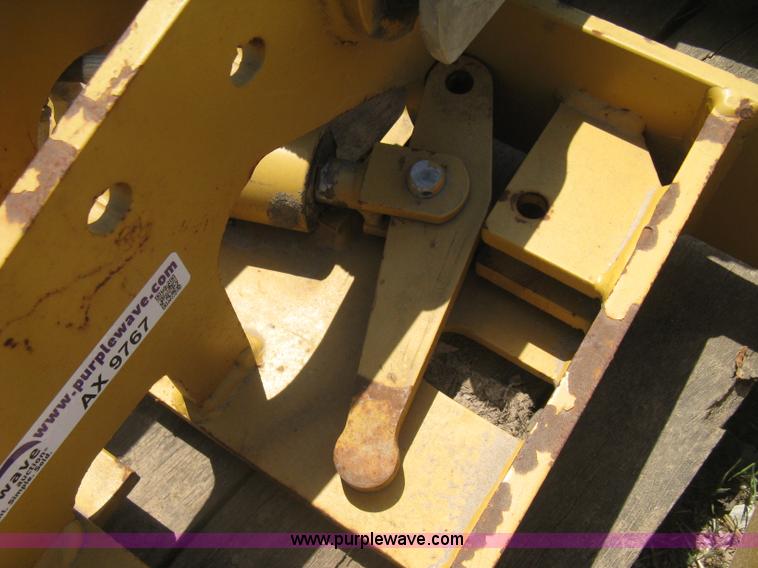 image for item AX9767 Caterpillar quick attach loader coupler
