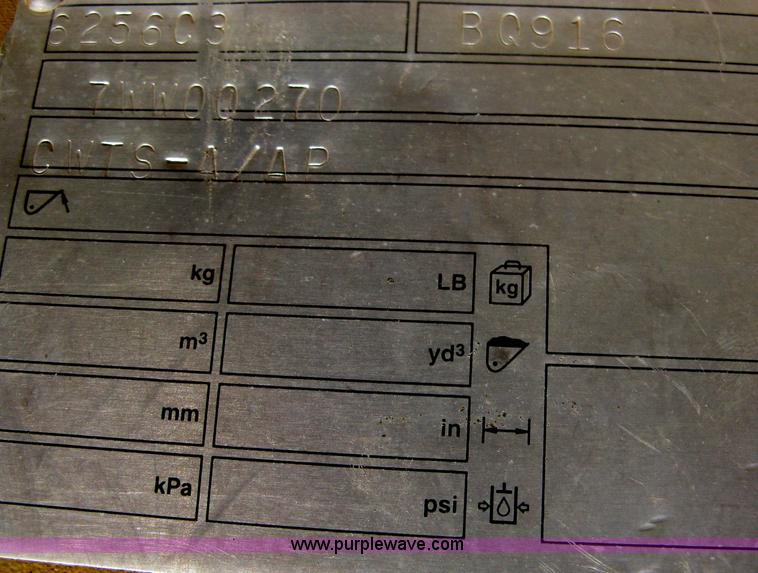 image for item AX9767 Caterpillar quick attach loader coupler