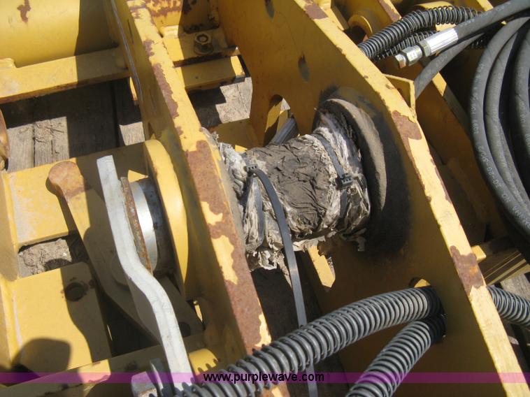 image for item AX9767 Caterpillar quick attach loader coupler