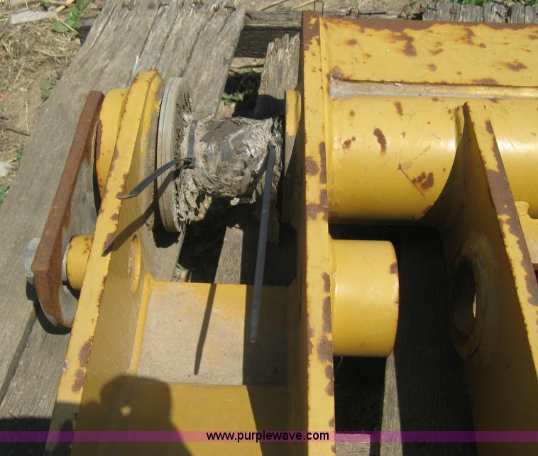 image for item AX9767 Caterpillar quick attach loader coupler