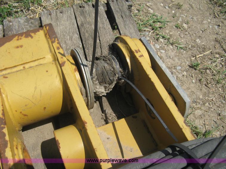 image for item AX9767 Caterpillar quick attach loader coupler