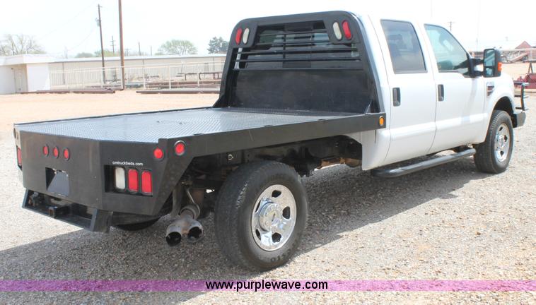 image for item C3810 2009 Ford F350 Super Duty Crew Cab utility truck