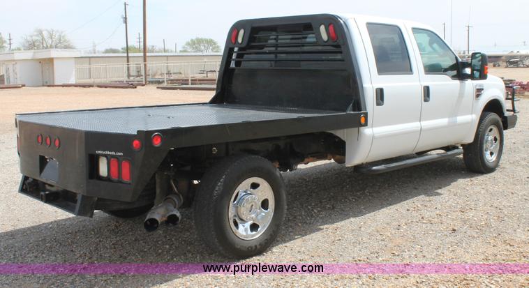 image for item C3810 2009 Ford F350 Super Duty Crew Cab utility truck