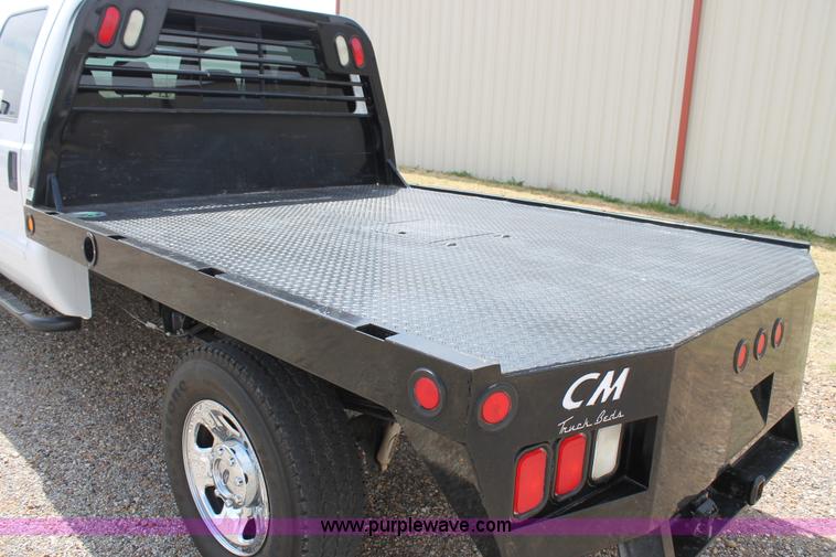 image for item C3810 2009 Ford F350 Super Duty Crew Cab utility truck