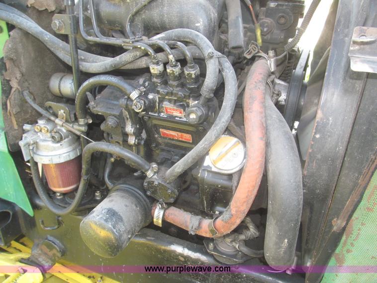 image for item F7354 1990 John Deere 955 MFWD tractor