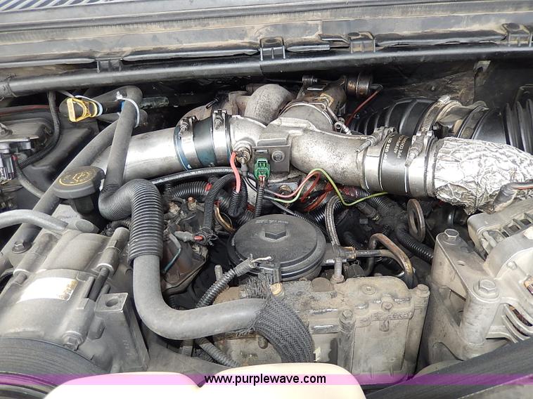 image for item H1398 2000 Ford F450 Super Duty XL flatbed truck