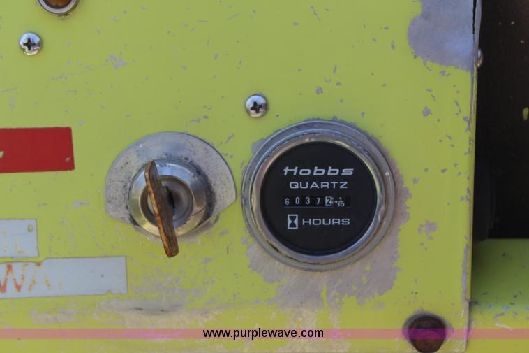 image for item H6049 Donkey with sod unroller