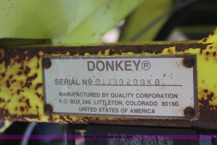 image for item H6049 Donkey with sod unroller