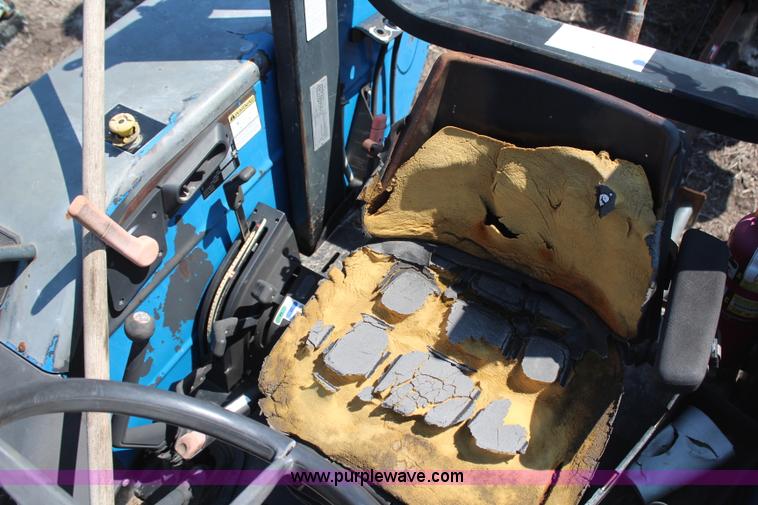 image for item H6058 1998 New Holland TL80 MFWD tractor