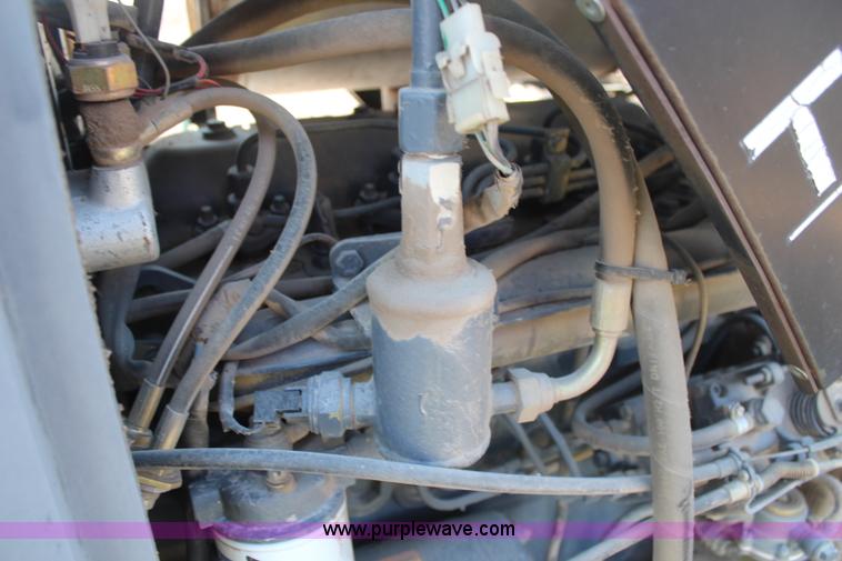 image for item H6058 1998 New Holland TL80 MFWD tractor