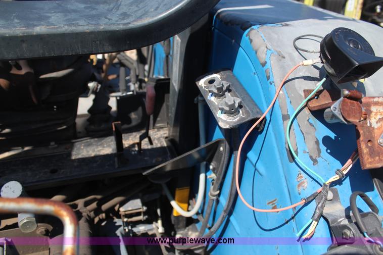 image for item H6058 1998 New Holland TL80 MFWD tractor