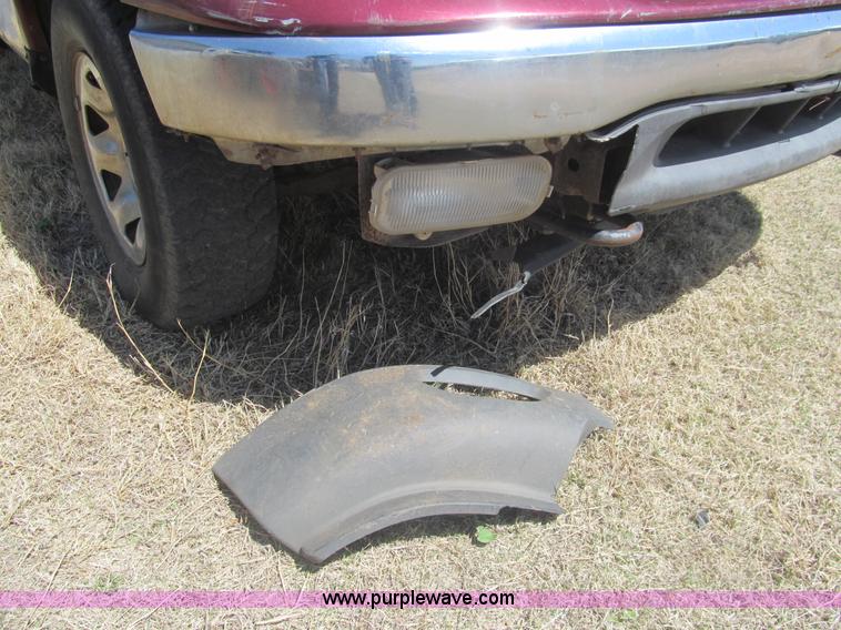 image for item I7124 2003 Ford F150 XLT flatbed pickup truck