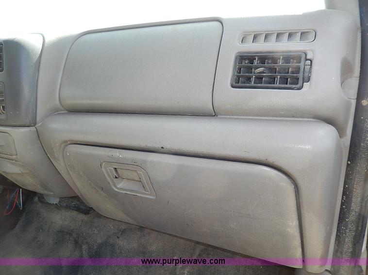 image for item I9292 2000 Ford F450 Super Duty XL flatbed truck