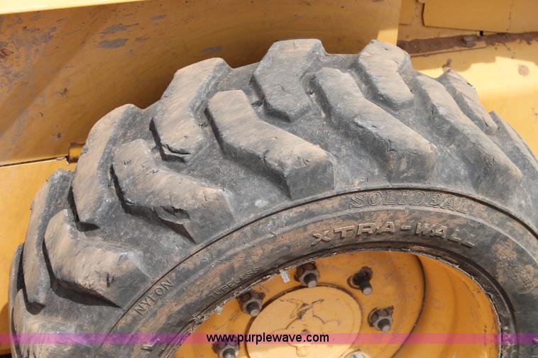 image for item C3807 John Deere 7775 skid steer