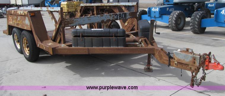 image for item E4687 2003 Bil-jax tandem axle tilt deck equipment trailer