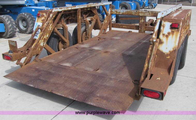 image for item E4687 2003 Bil-jax tandem axle tilt deck equipment trailer