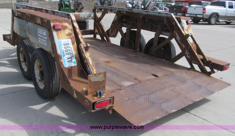 image for item E4687 2003 Bil-jax tandem axle tilt deck equipment trailer