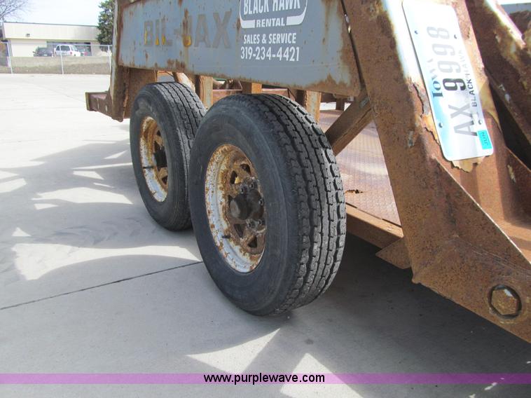 image for item E4687 2003 Bil-jax tandem axle tilt deck equipment trailer
