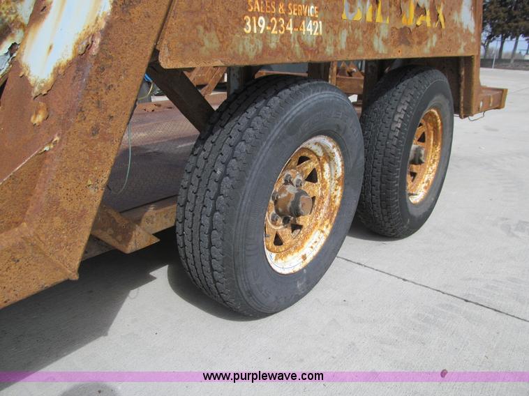 image for item E4687 2003 Bil-jax tandem axle tilt deck equipment trailer