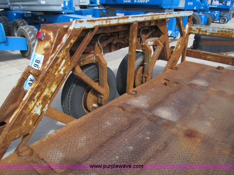 image for item E4687 2003 Bil-jax tandem axle tilt deck equipment trailer