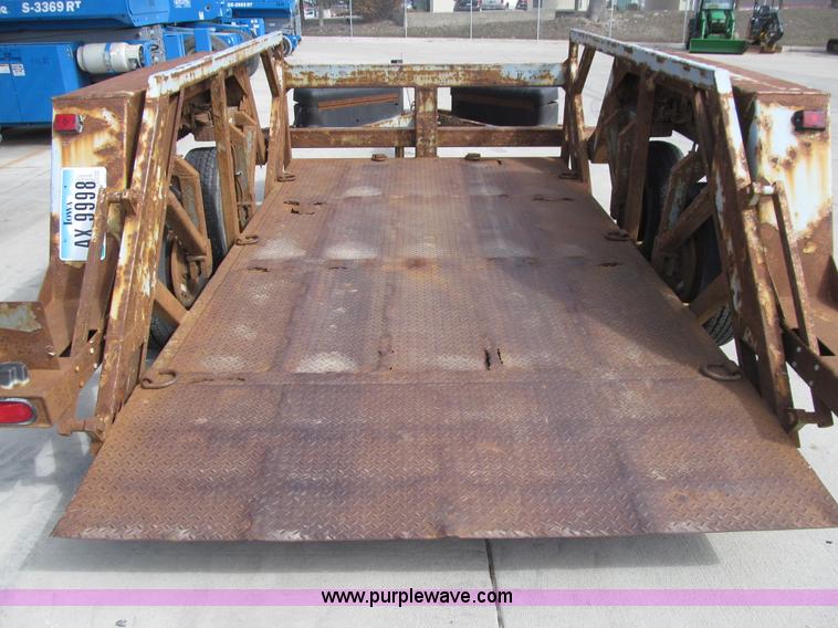 image for item E4687 2003 Bil-jax tandem axle tilt deck equipment trailer