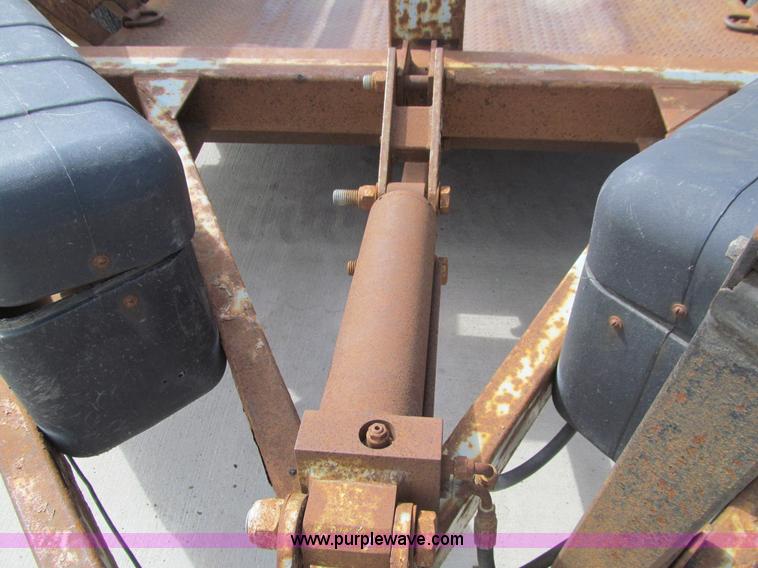 image for item E4687 2003 Bil-jax tandem axle tilt deck equipment trailer