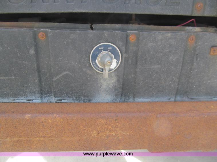 image for item E4687 2003 Bil-jax tandem axle tilt deck equipment trailer