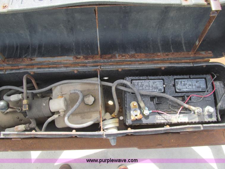 image for item E4687 2003 Bil-jax tandem axle tilt deck equipment trailer