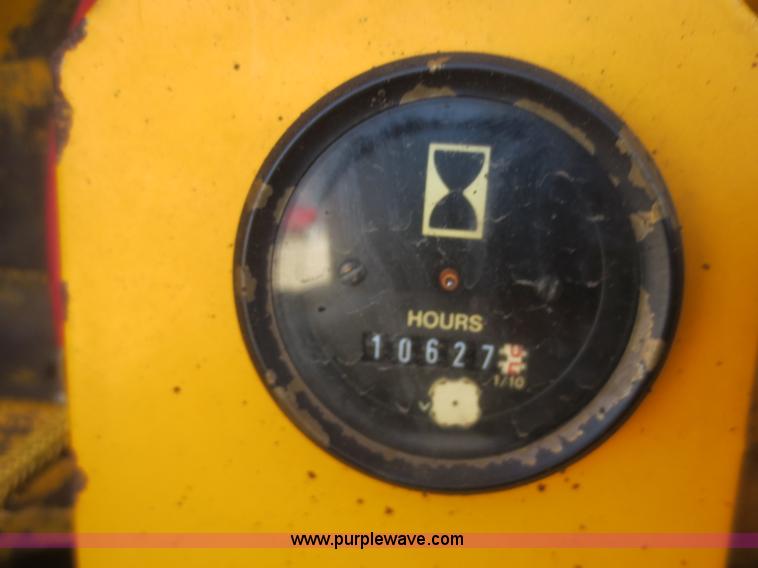 image for item F6870 1989 John Deere 772BH motor grader