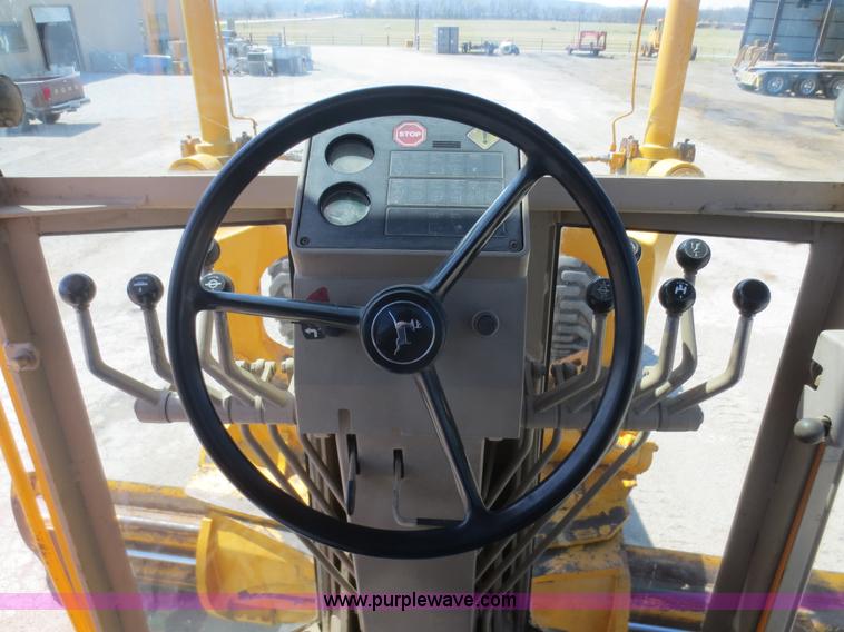 image for item F6870 1989 John Deere 772BH motor grader