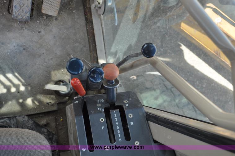 image for item G6454 1998 John Deere 770CH articulated motor grader