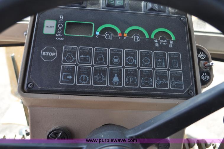 image for item G6454 1998 John Deere 770CH articulated motor grader