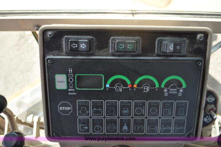 image for item G6454 1998 John Deere 770CH articulated motor grader