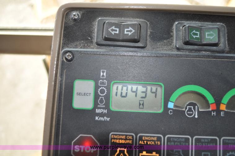 image for item G6454 1998 John Deere 770CH articulated motor grader