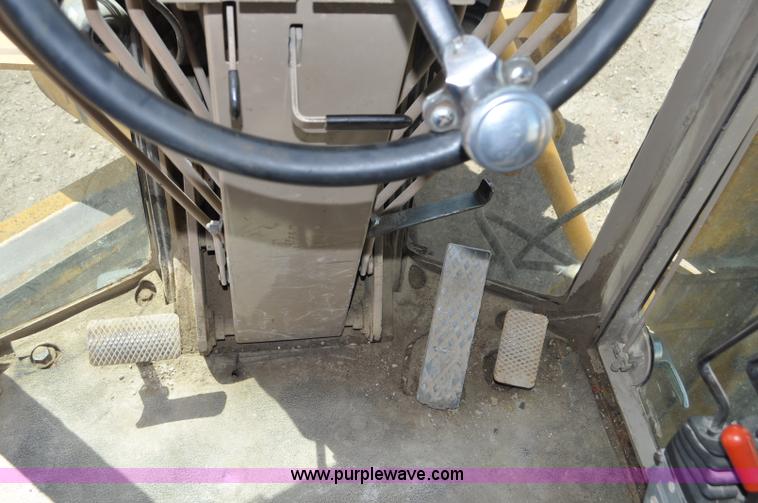 image for item G6454 1998 John Deere 770CH articulated motor grader