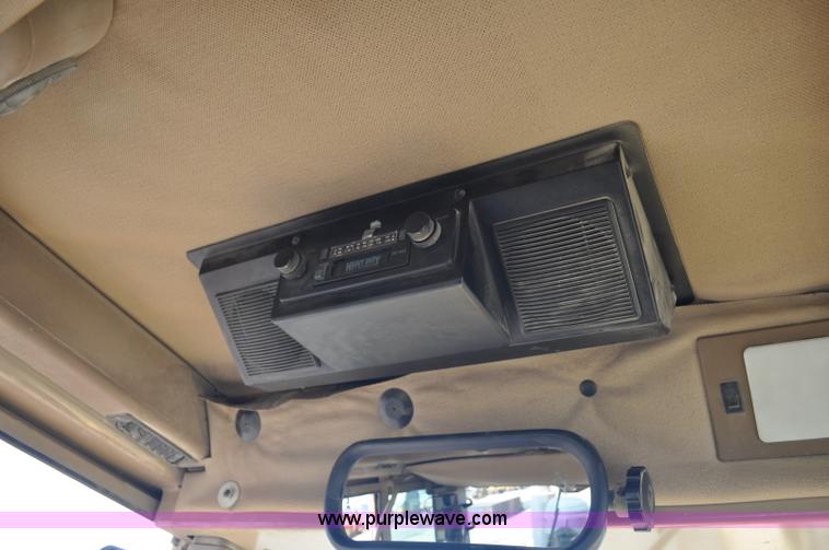 image for item G6454 1998 John Deere 770CH articulated motor grader